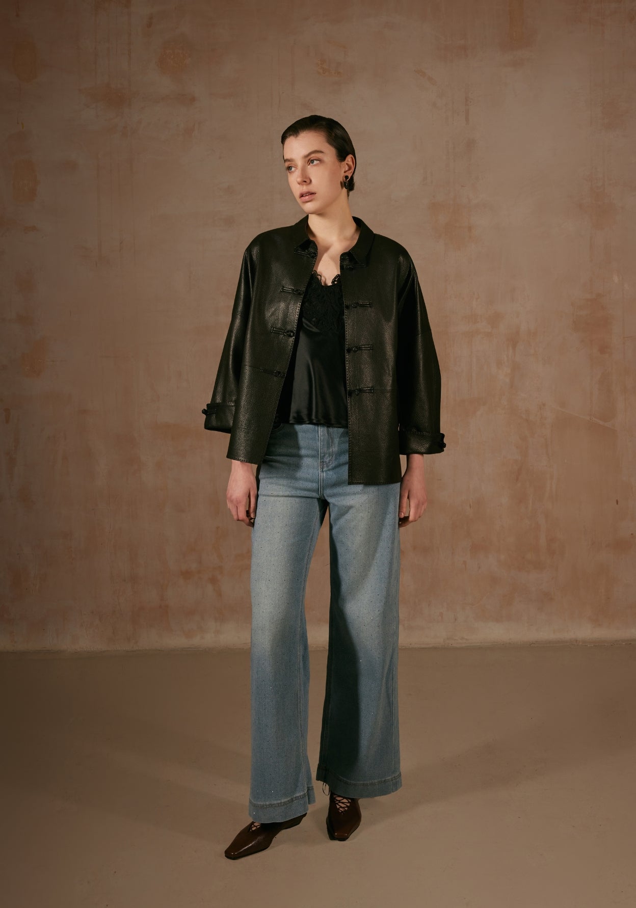 Black Leather Jacket with Button Details