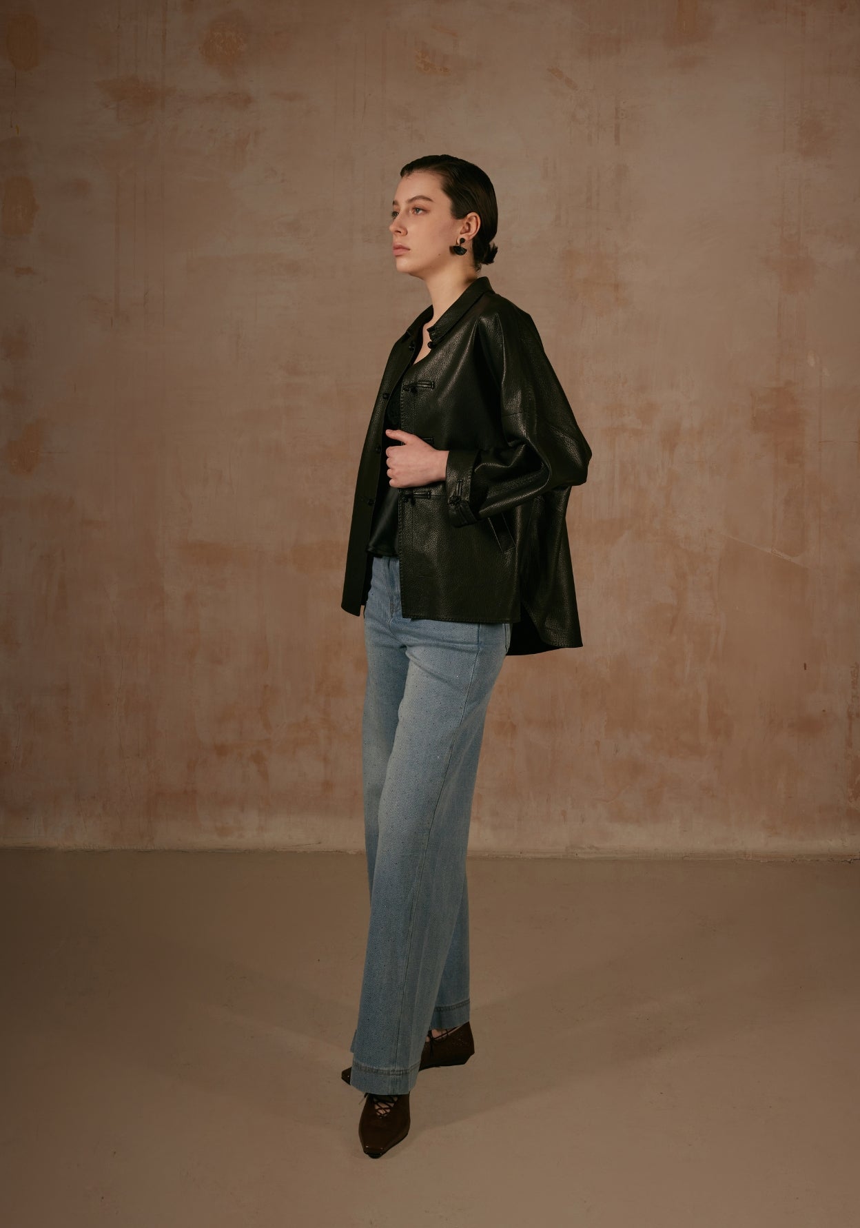 Black Leather Jacket with Button Details