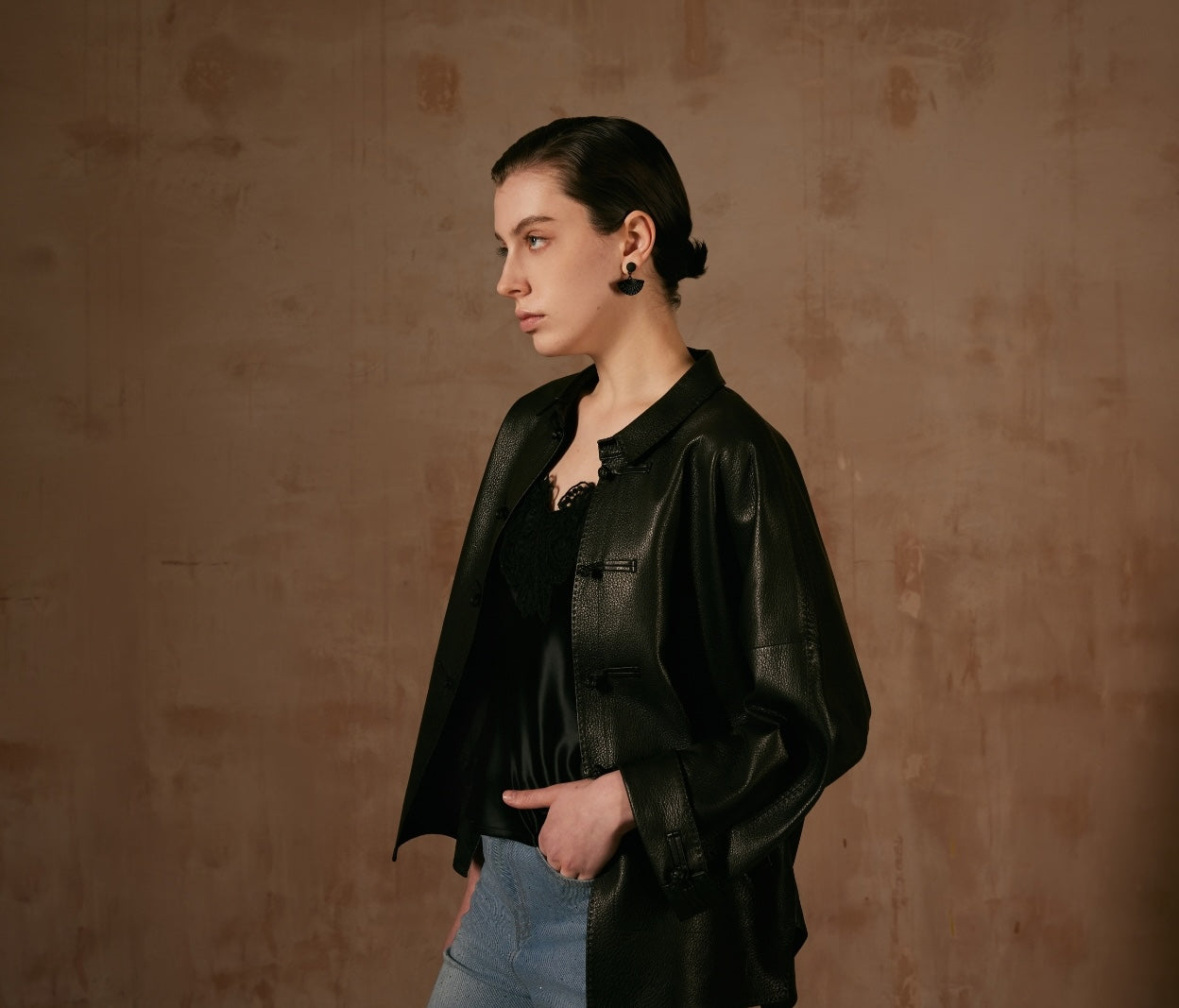 Black Leather Jacket with Button Details