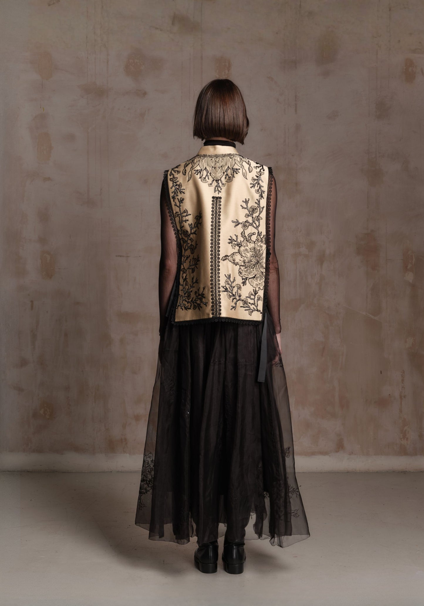 Beige Vest with Black Beadings and Ribbon on the Side