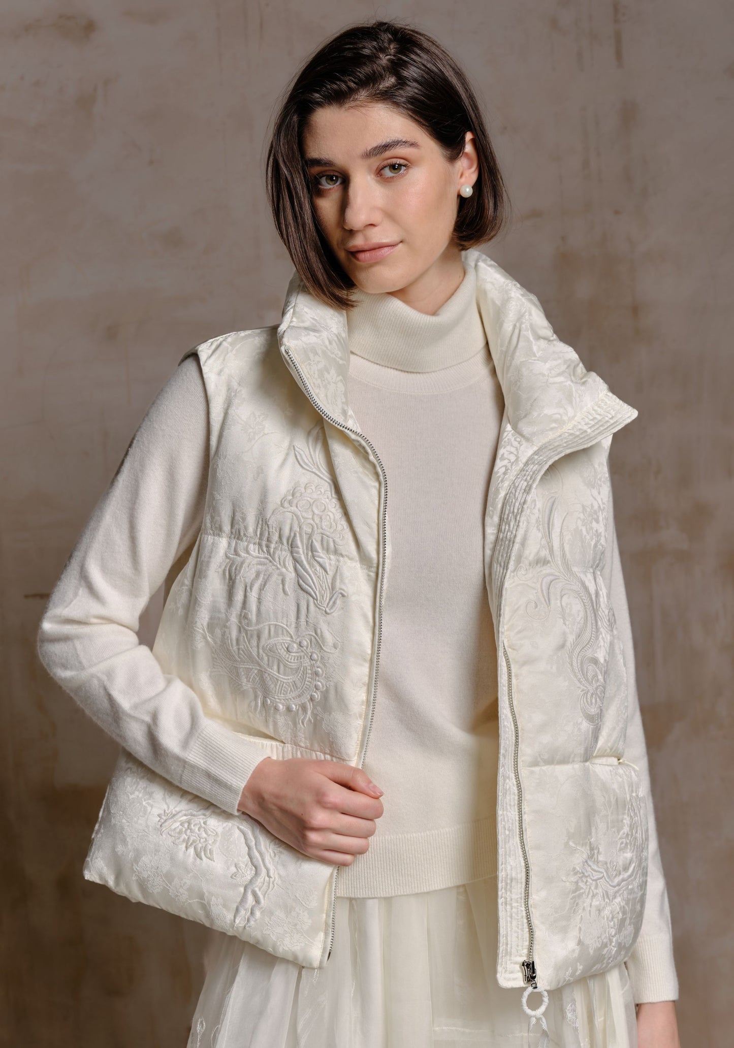 White Puffer Vest with Emboidery Details