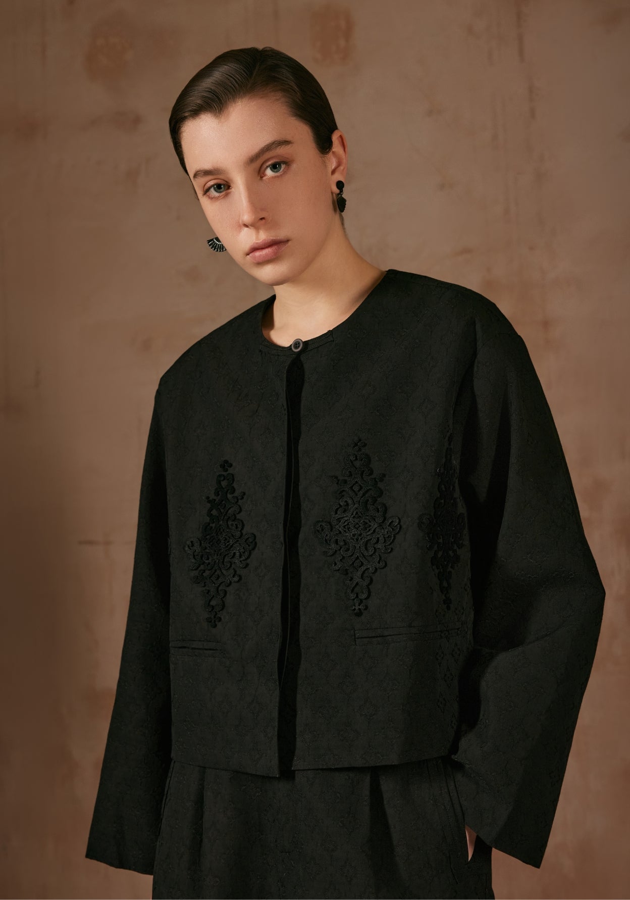 Black Jacket with Laser Cutting Details