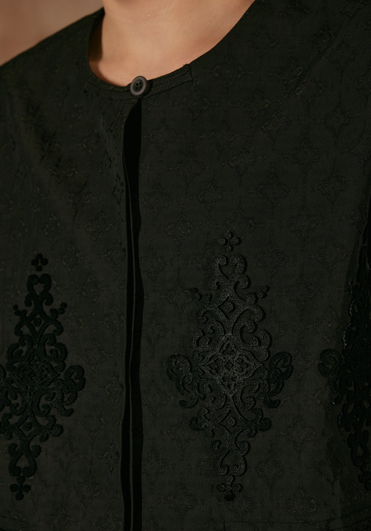 Black Jacket with Laser Cutting Details