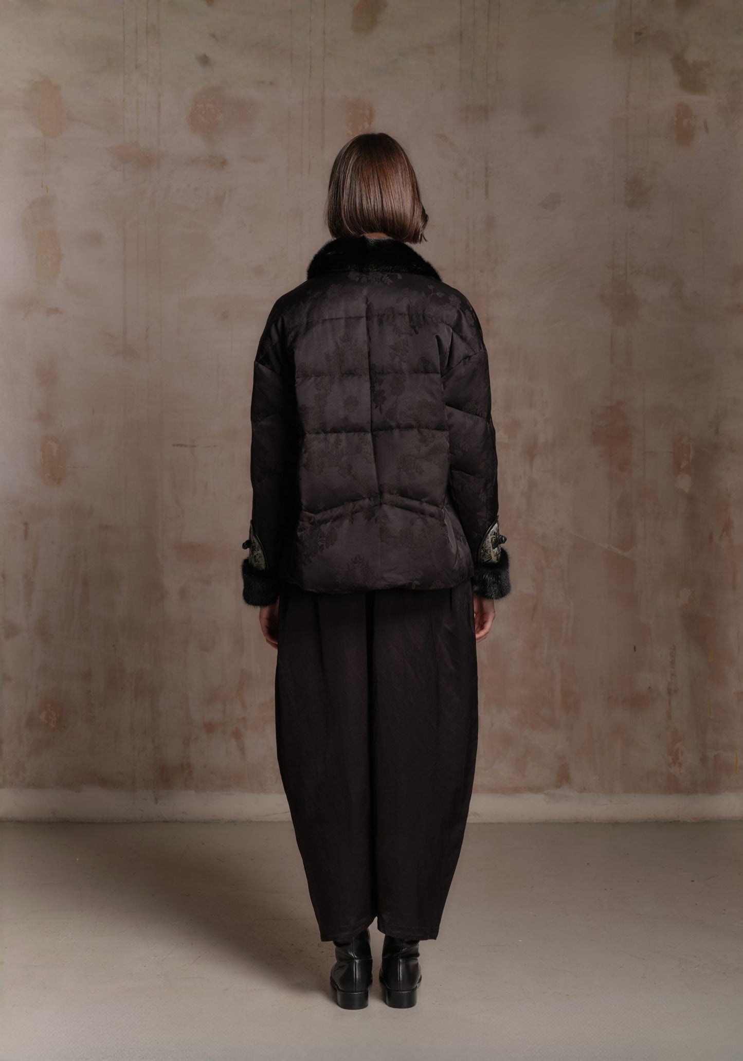 Black Puffer Jacket with Green Chinese Details