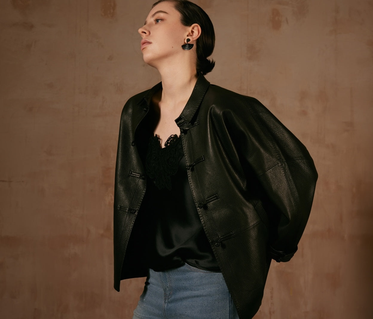 Black Leather Jacket with Button Details