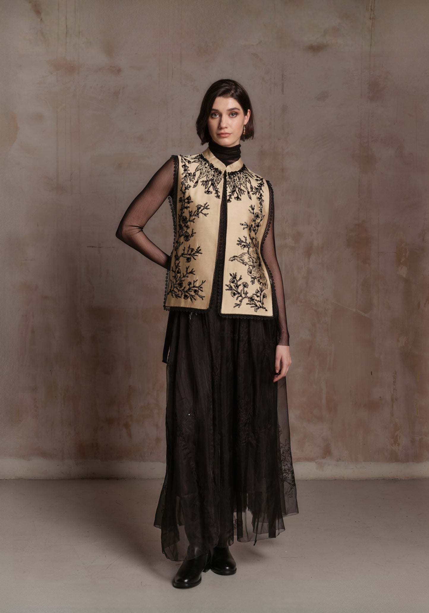 Beige Vest with Black Beadings and Ribbon on the Side