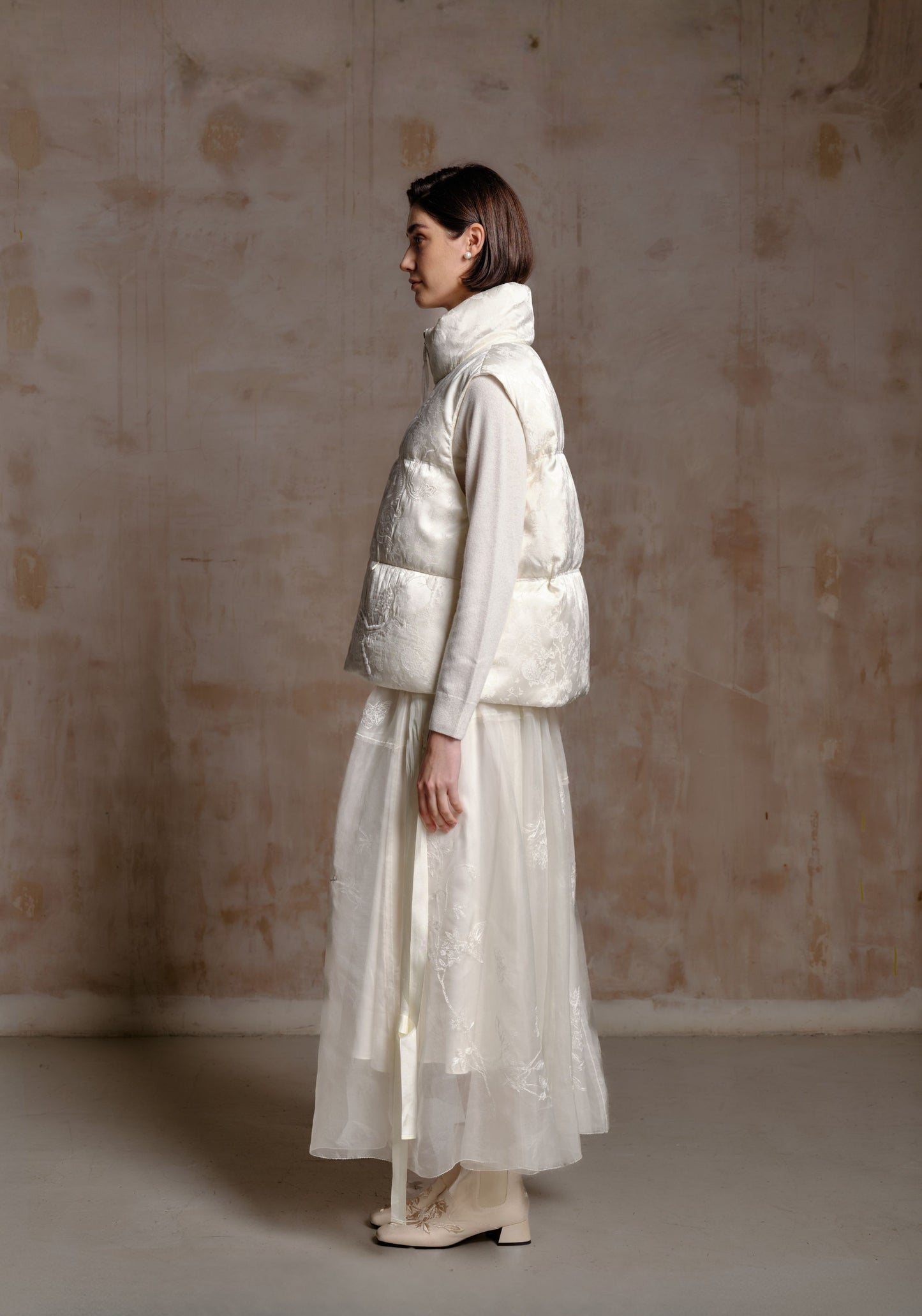 White Puffer Vest with Emboidery Details