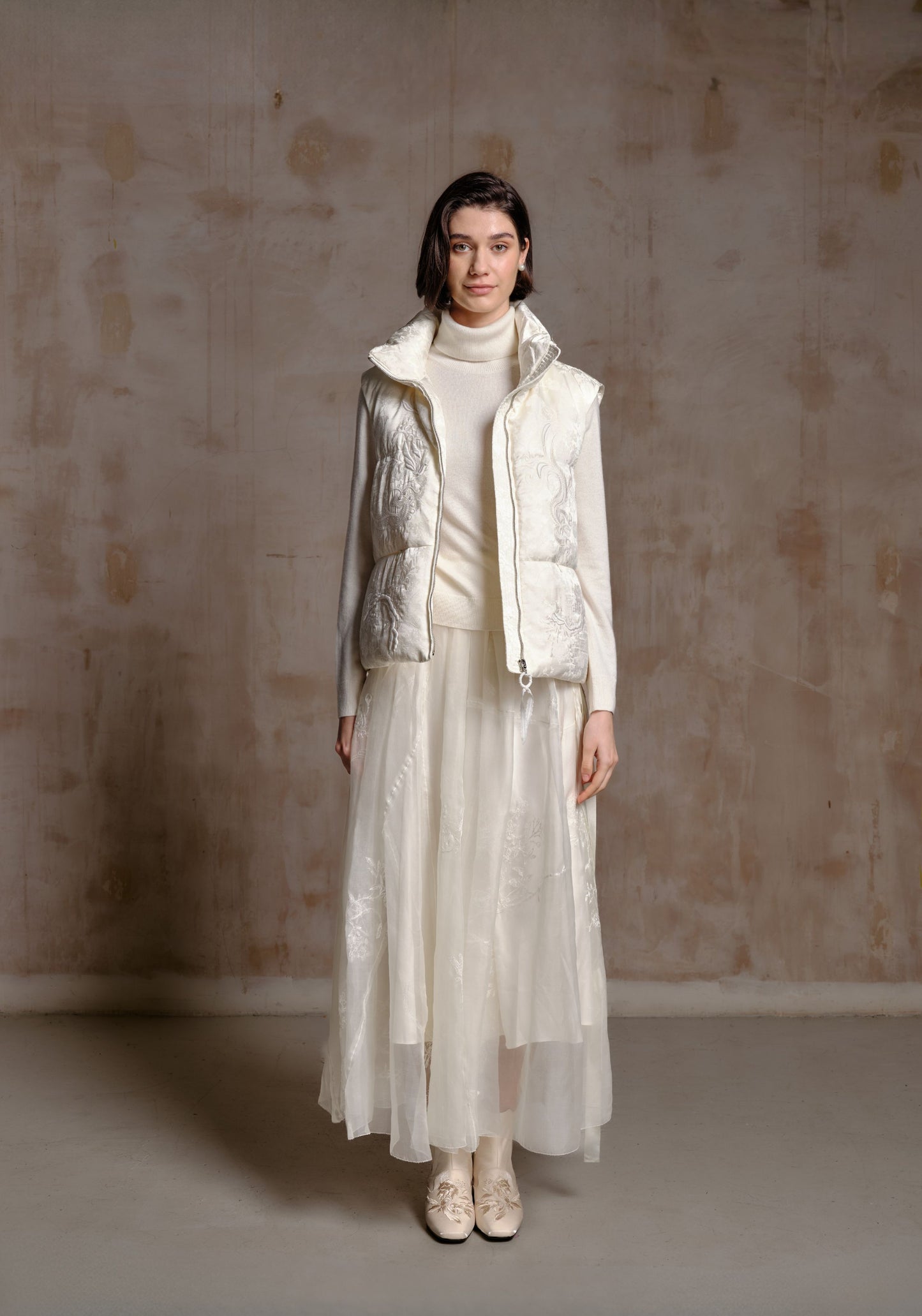 White Puffer Vest with Emboidery Details