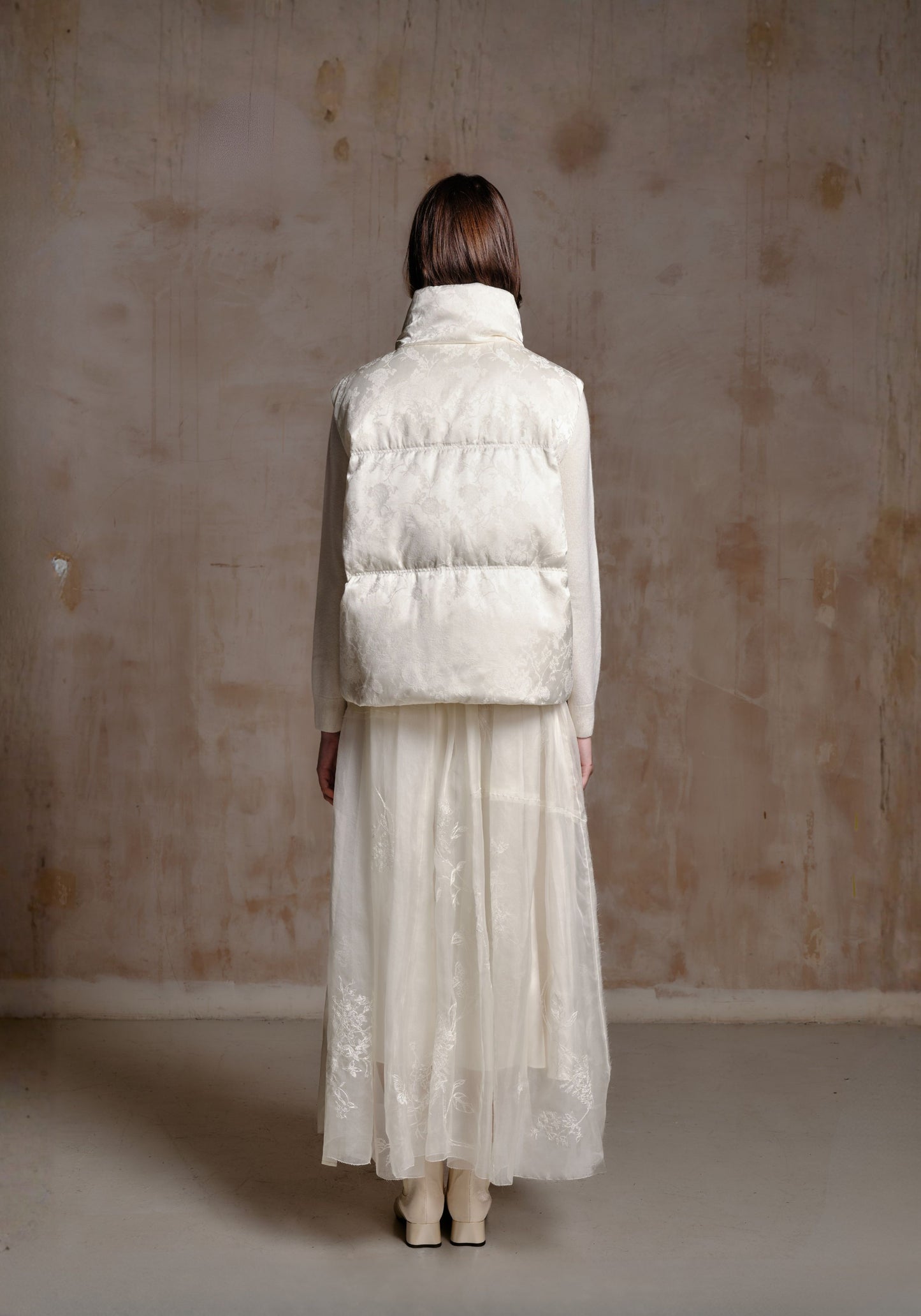 White Puffer Vest with Emboidery Details