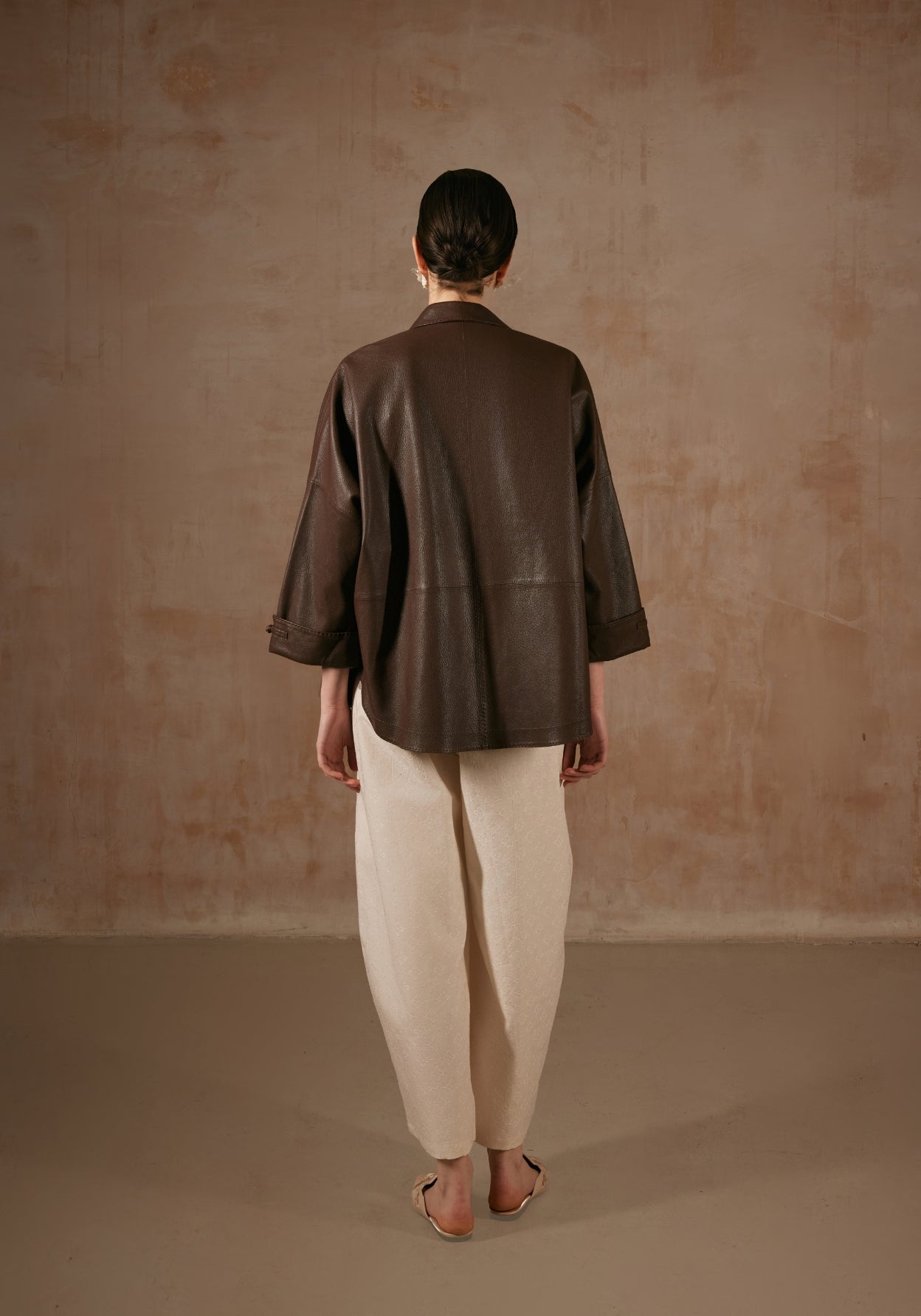 Brown Leather Jacket with Button Details