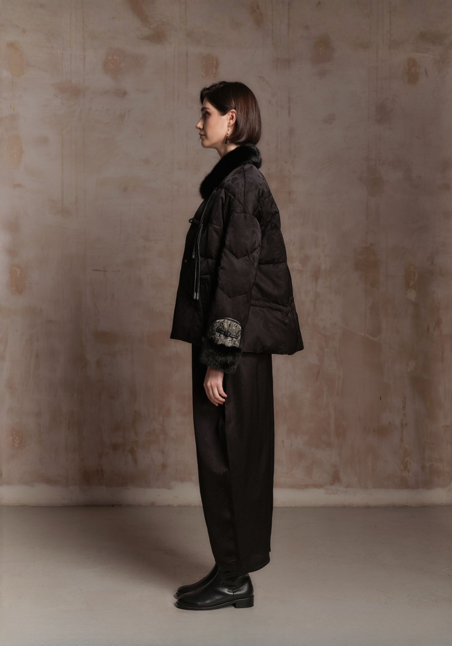 Black Puffer Jacket with Green Chinese Details