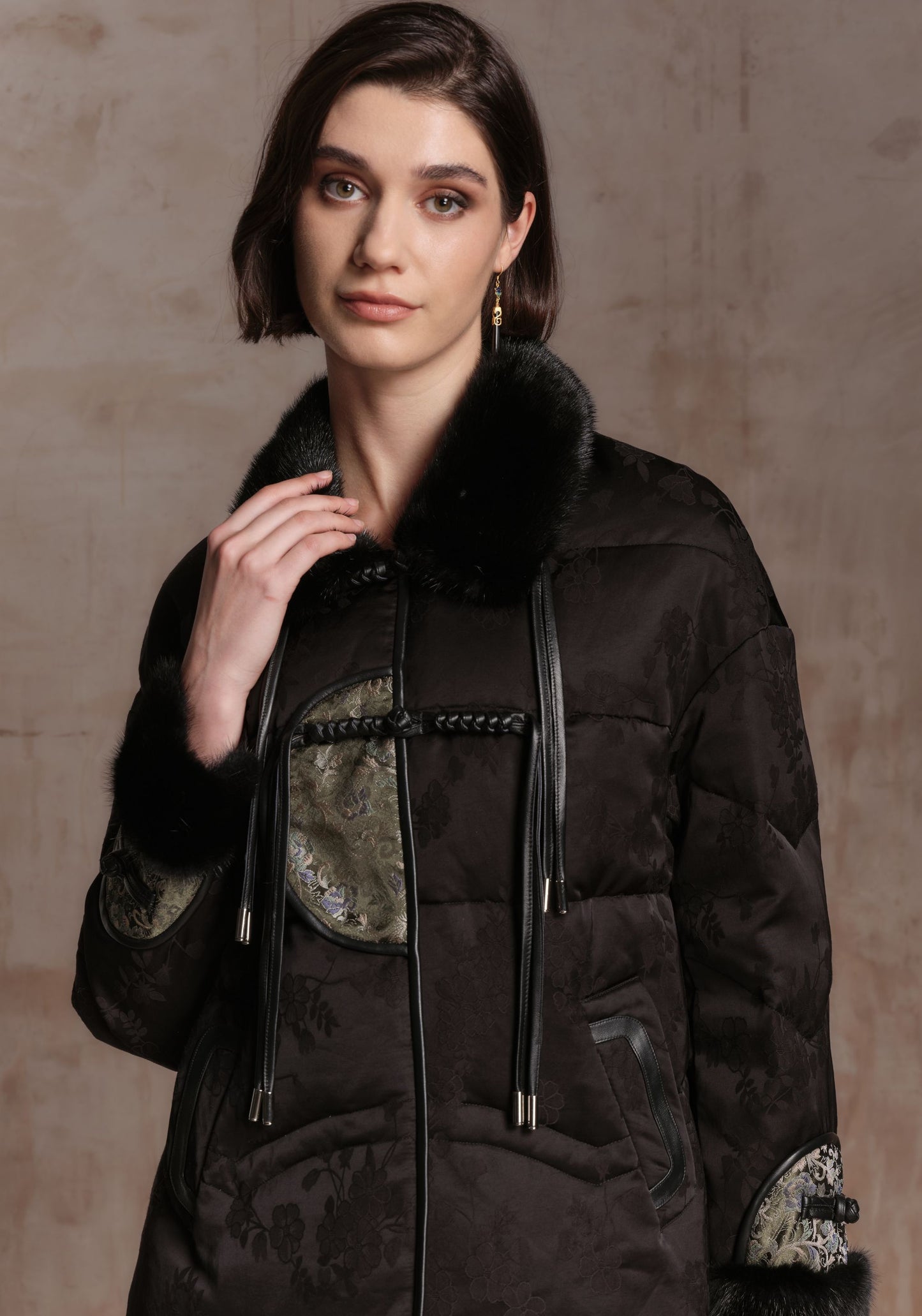 Black Puffer Jacket with Green Chinese Details