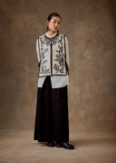 White Vest with Black Beadings and Ribbon on the Side