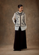 White Vest with Black Beadings and Ribbon on the Side