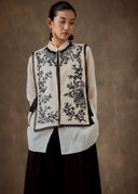 White Vest with Black Beadings and Ribbon on the Side